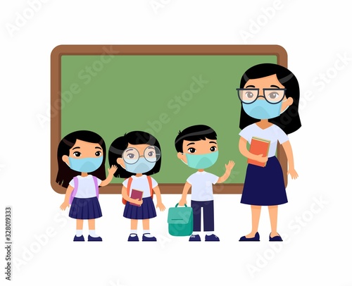 Asian female teacher and pupils  with protective masks on their faces. Boys and girls dressed in school uniform and female teacher. Respiratory protection, allergies concept.