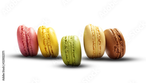 Macarons on White Background. Colorful French Biscuits Set. Traditional Sweet Cookies.