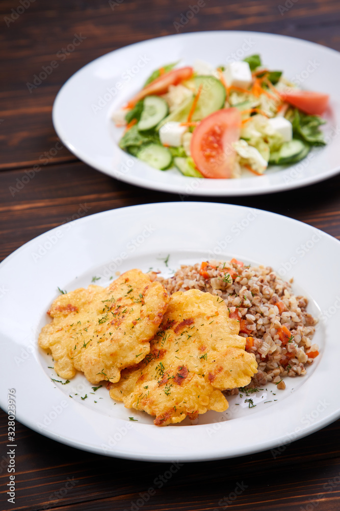 fried chicken breast with buckwheat and salad fried chicken breast with buckwheat and salad