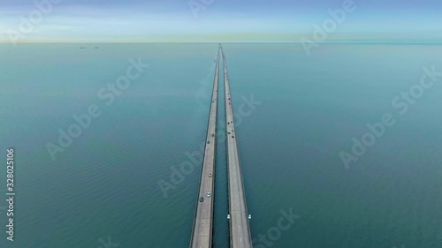 Aerial: Traffic on the Lake Pontchartrain causeway, New Orleans. Louisiana, USA photo