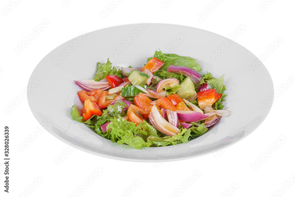 Vegetable salad with lettuce, red onion, cucumber, tomato, bell pepper, oil on plate, white isolated background Side view. For the menu, restaurant bar cafe
