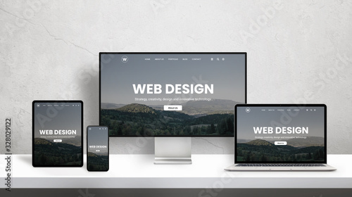 Web design studio promotion page on different display devices. Portfolio web design page concept photo