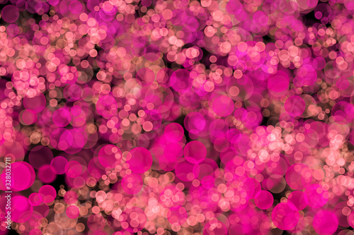 Fototapeta Naklejka Na Ścianę i Meble -  Abstract Blur Bokeh lights effect on pink colour, Black Background, Glitter, Defocused, Seamless polka dot pattern , Creative, Illustration design