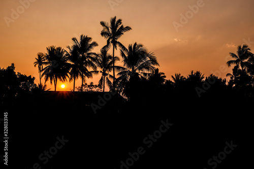 sunset on the beach © chavalitpanguta