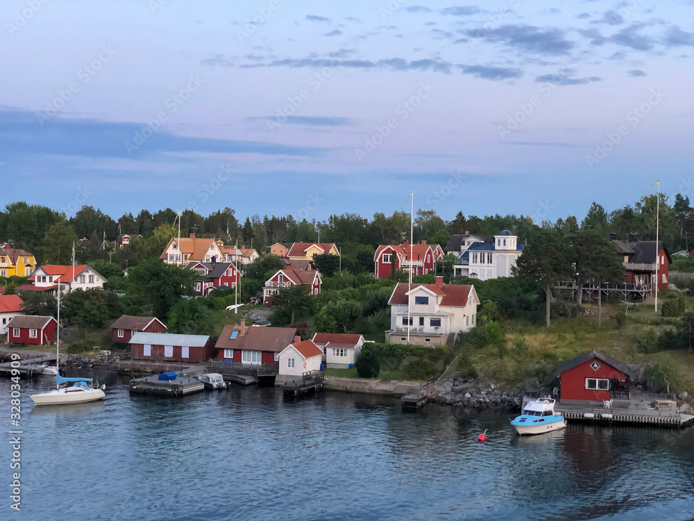 Vacation homes on island in Stockholm Archipelago Sweden, view from cruise ship