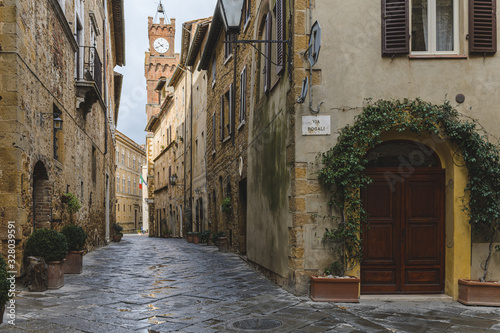 Fototapeta Naklejka Na Ścianę i Meble -  Walk on a rainy day through the streets of the beautiful town, Pienza, Tuscany