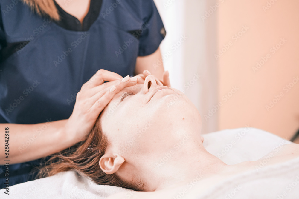 massage therapists in the massage room massage the girl on the massage table massage therapists in the massage room massage the girl on the massage table