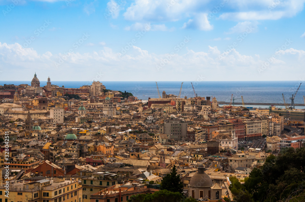 Top aerial scenic panoramic view from above of old historical centre quarter districts of  Genoa (Genova), port and harbor of Ligurian and Mediterranean Sea, Liguria, Italy.
