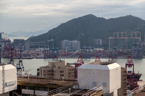 Container port wide river between Hong Kong industrial districts © Yan