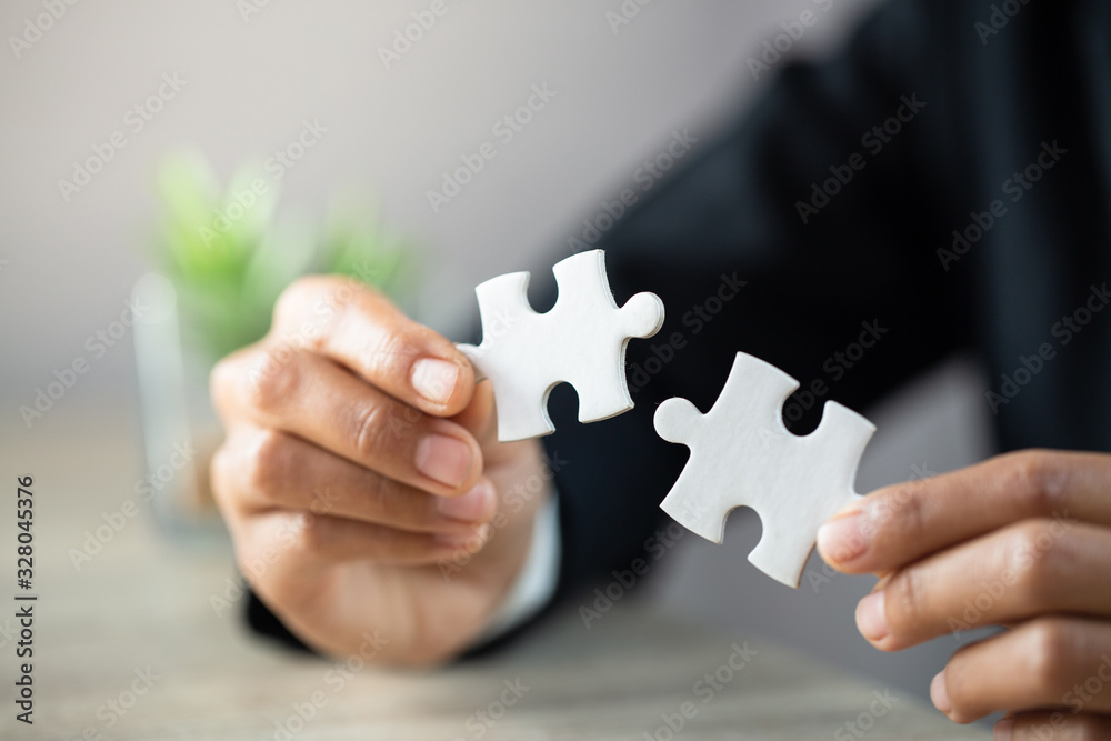 Woman hWoman hands connecting couple jigsaw puzzle . Woman hWoman hands connecting couple jigsaw puzzle .