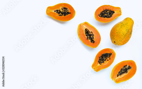 Papaya fruit on white background.