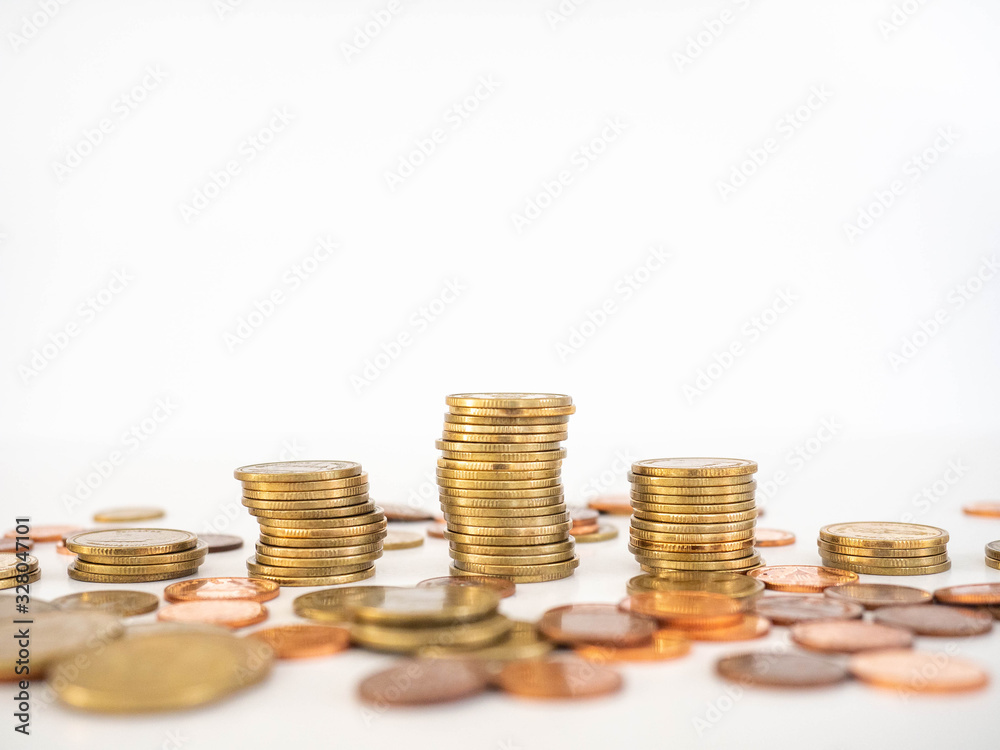 Thai Baht Coins colors Gold set in the mountains,Is the currency of Thailand.For business expenses,Coin is in a jar of money saving,White background Thai Baht Coins colors Gold set in the mountains,Is the currency of Thailand.For business expenses,Coin is in a jar of money saving,White background