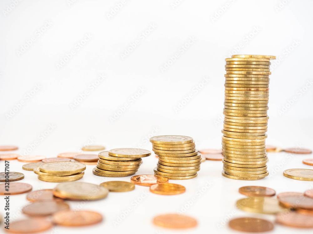 Thai Baht Coins colors Gold set in the mountains,Is the currency of Thailand.For business expenses,Coin is in a jar of money saving,White background Thai Baht Coins colors Gold set in the mountains,Is the currency of Thailand.For business expenses,Coin is in a jar of money saving,White background
