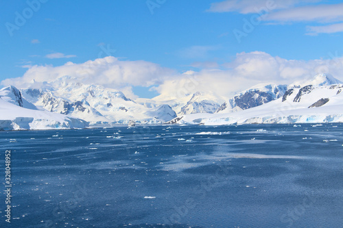 Frozen coasts, icebergs and mountains of the Antarctic Peninsula. The mountains at Paradise Bay on the Danco Coast, Antarctica © Marco Ramerini