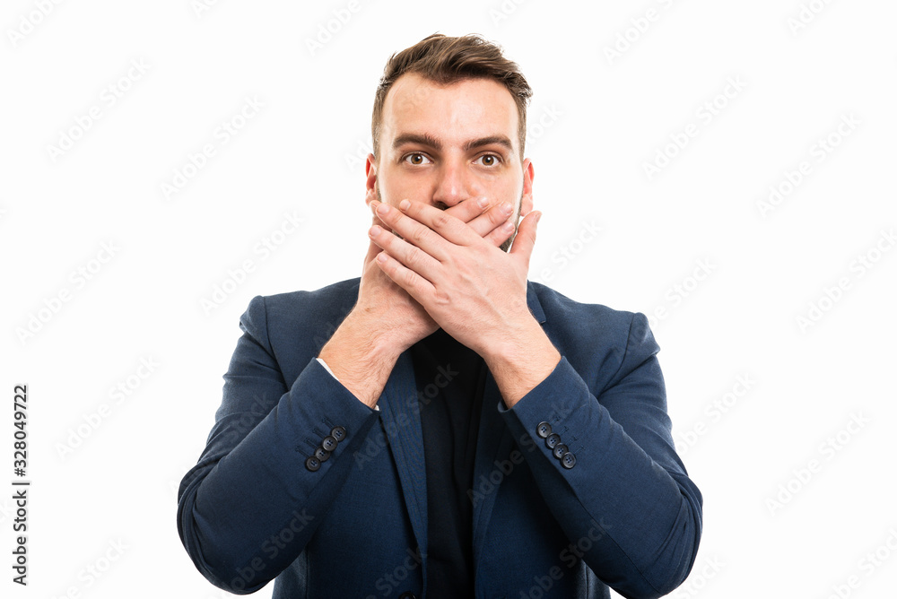 Business man wearing smart casual clothes covering mouth Business man wearing smart casual clothes covering mouth
