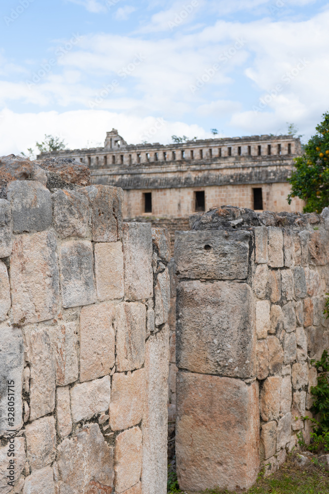 Fragment of palace of the Masks (Codz Poop) in Kabah Mayan archaeological site. Yucatan. Mexico.