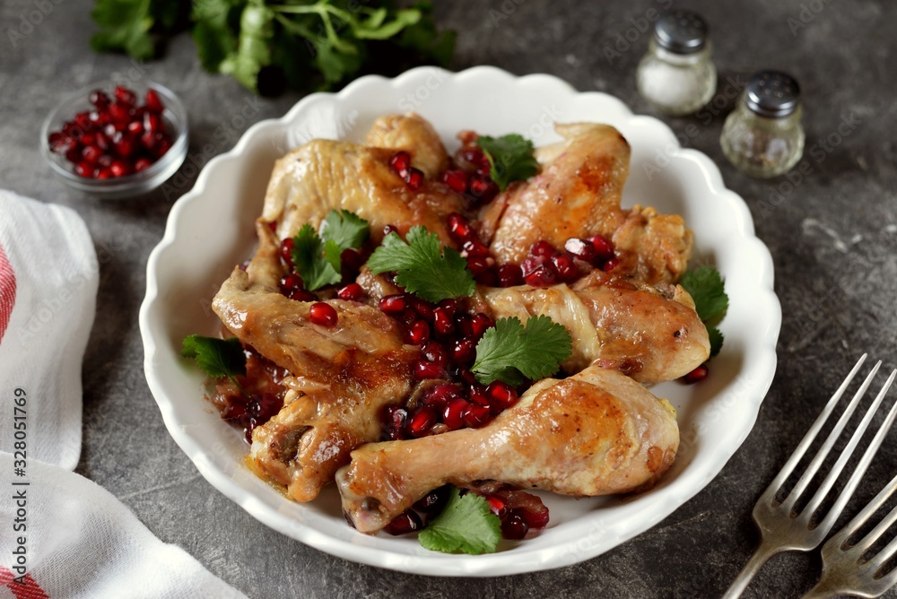 Armenian traditional chicken dish with onions, pomegranate and coriander seeds in white wine. Armenian traditional chicken dish with onions, pomegranate and coriander seeds in white wine.