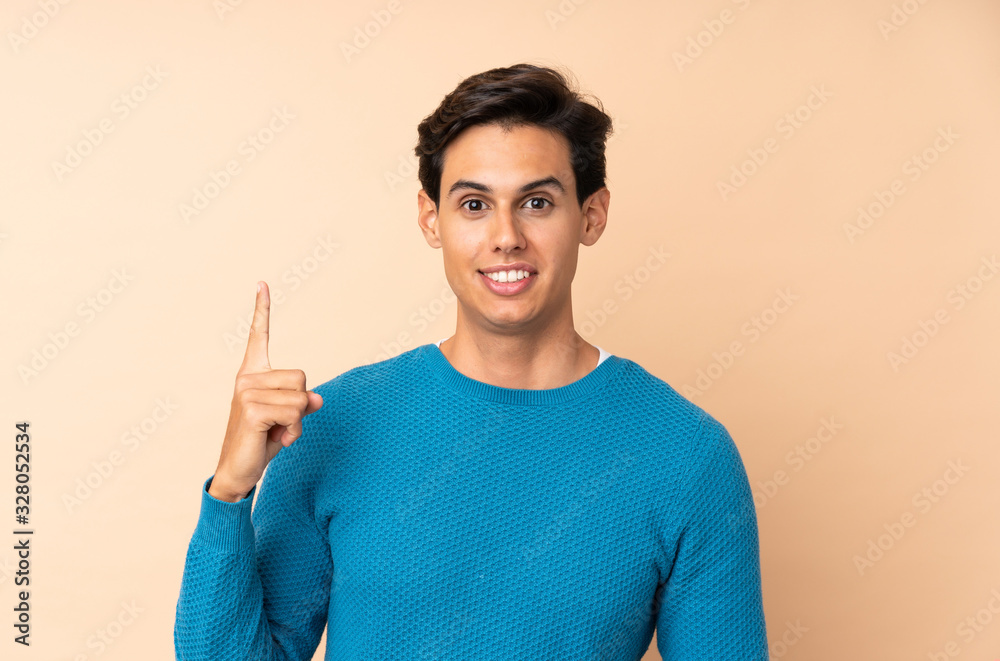 Man over isolated background pointing with the index finger a great idea Man over isolated background pointing with the index finger a great idea