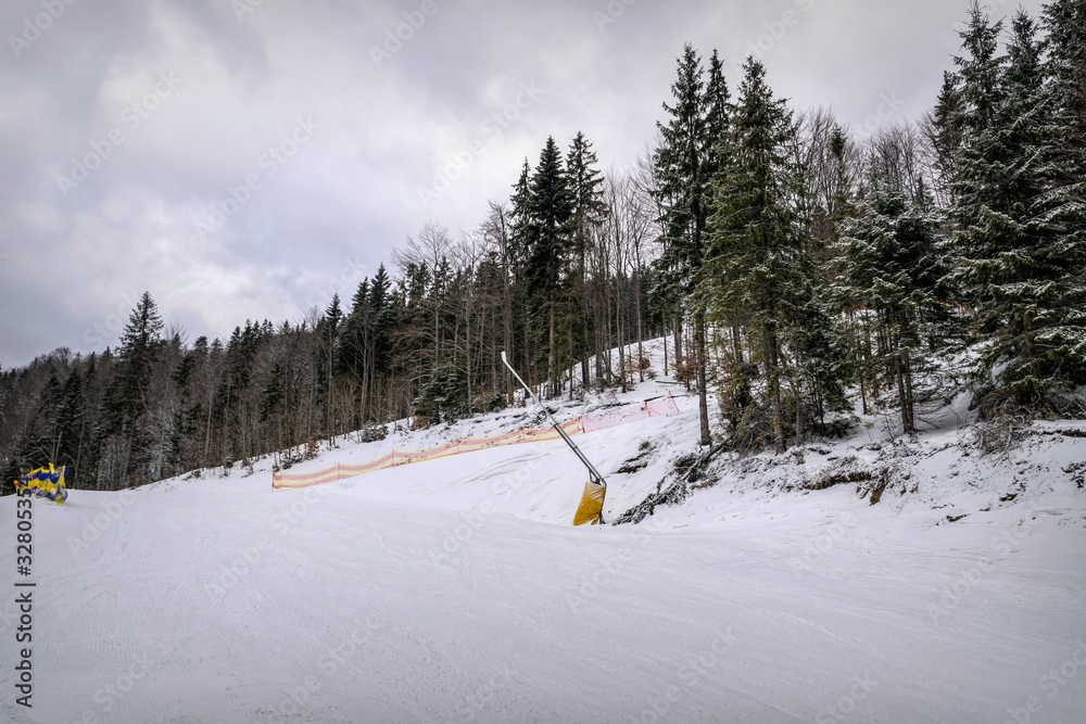 Fototapeta premium Winter cloudy landscape of the Carpathian Mountains in Eastern Europe