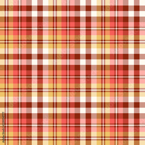 Seamless pattern in marvelous brown, yellow, red and white colors for plaid, fabric, textile, clothes, tablecloth and other things. Vector image.
