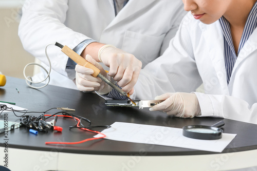 Electronic technicians work...