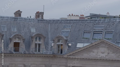 Aerial drone shot of Paris rooftop architecture 