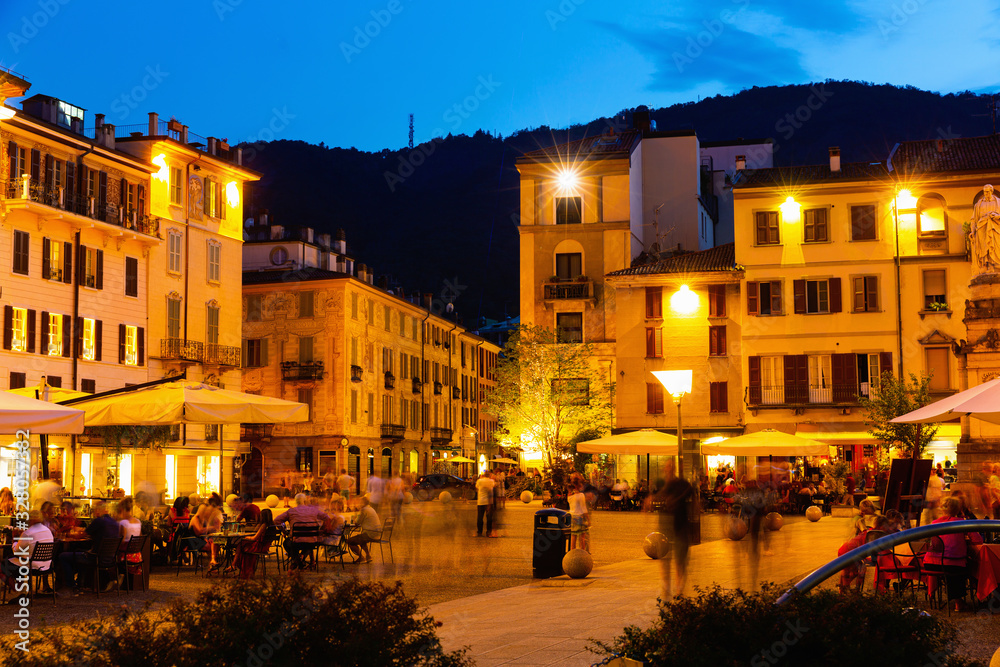 Busy nightlife of Como streets, Italy