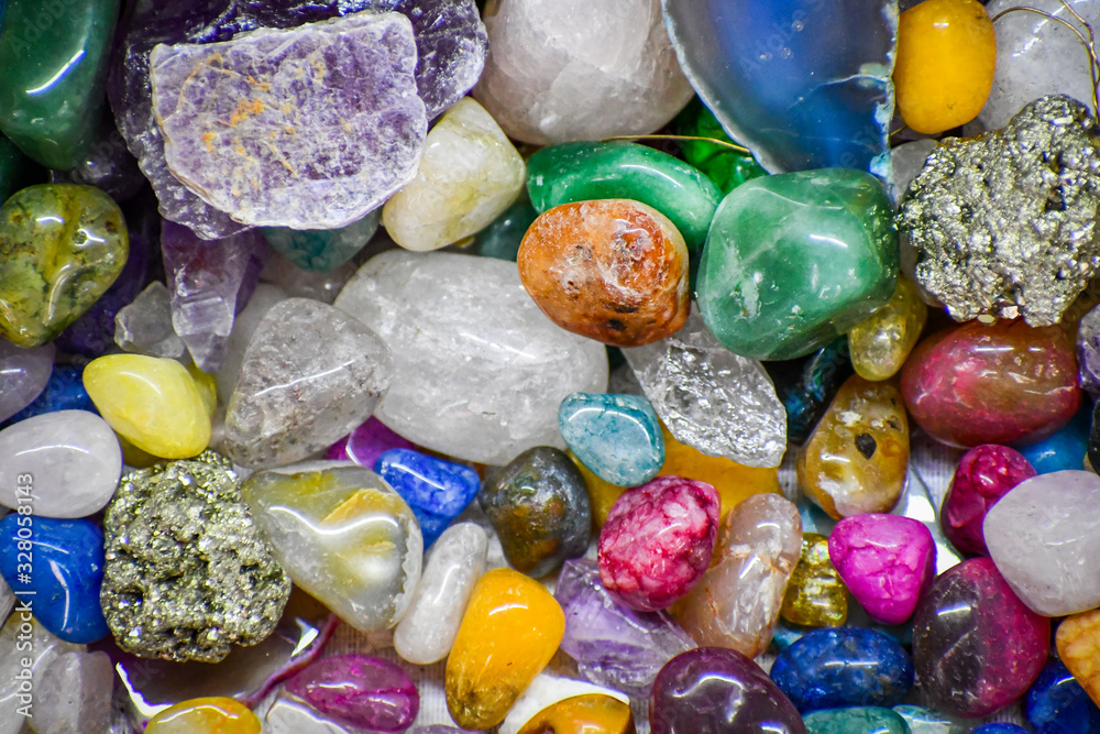 Mineral crystals and tumbled gemstones, with energy effect, in different structures and colors. Mineral crystals and tumbled gemstones, with energy effect, in different structures and colors.