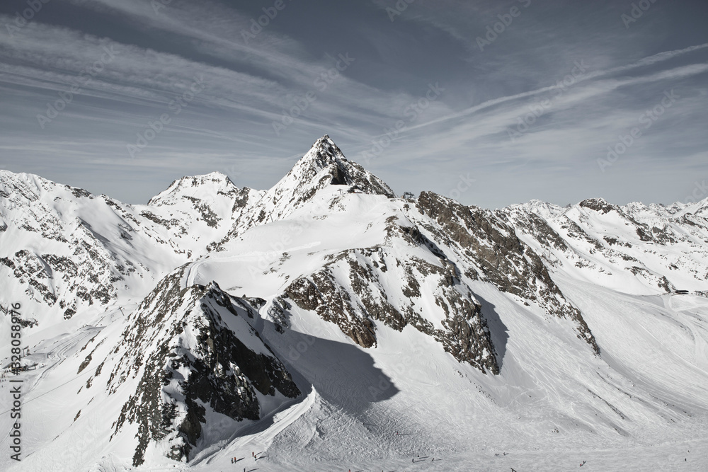 Alpine winter wonderland in Europe. Mountains in Austria in the Alps of Tyrol. Glacier Stubaier Gletscher. Iconic peak