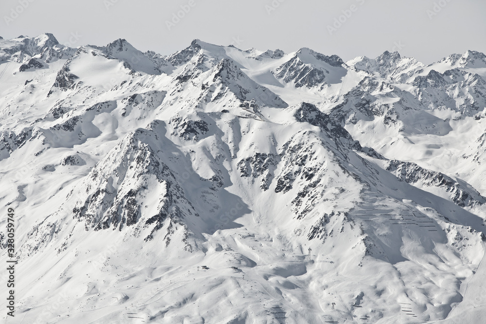 Obraz premium Alpine winter wonderland in Europe. Mountains in Austria in the Alps of Tyrol. Glacier Stubaier Gletscher. Awesome panorama