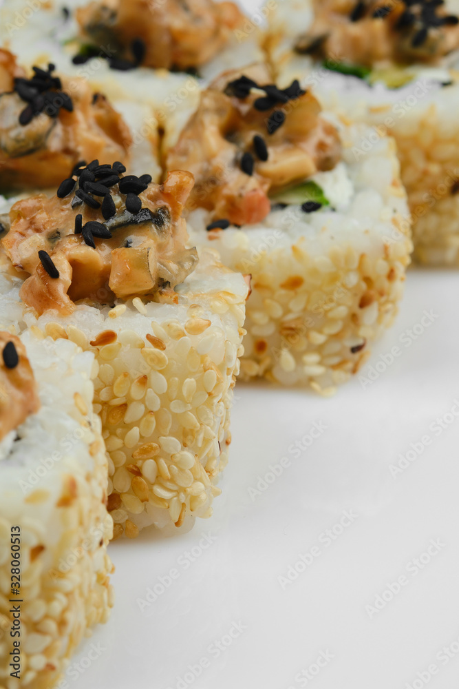 roll Shanghai with cream cheese, cucumber, eel, sesame. isolated on white background. roll Shanghai with cream cheese, cucumber, eel, sesame. isolated on white background.