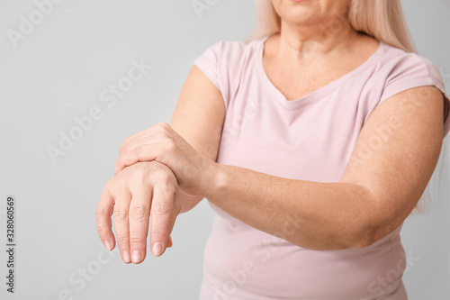 Senior woman suffering from...