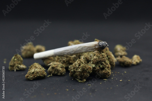 Wallpaper Mural Cannabis and joint isolated on a black background. Torontodigital.ca