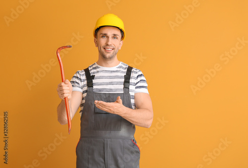 Handsome male worker with c...