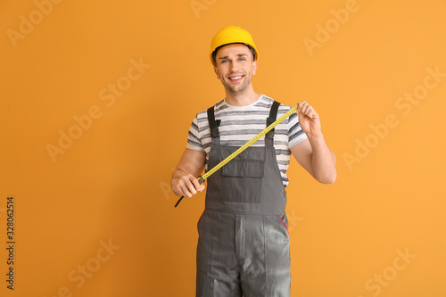 Handsome male worker with t...