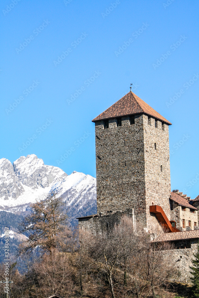 castles of south tyrol like castel tyrol  castel trauttmansdorff  castel torre  seen in a spectacular and unique way with backgrounds of lakes snowy mountains and rocks