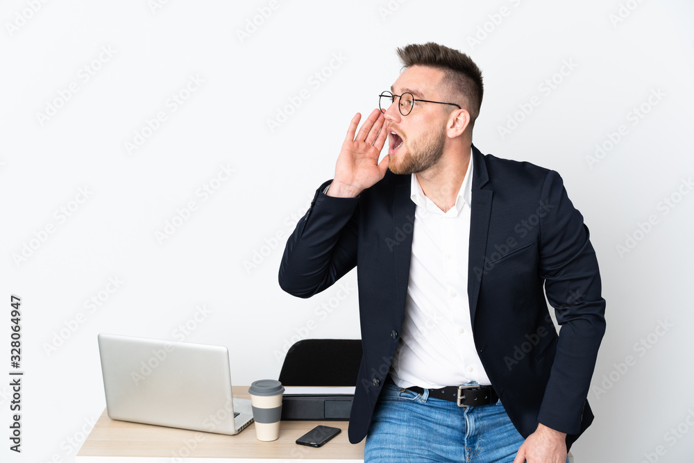 Russian man in a office isolated on white background shouting with mouth wide open to the lateral Russian man in a office isolated on white background shouting with mouth wide open to the lateral