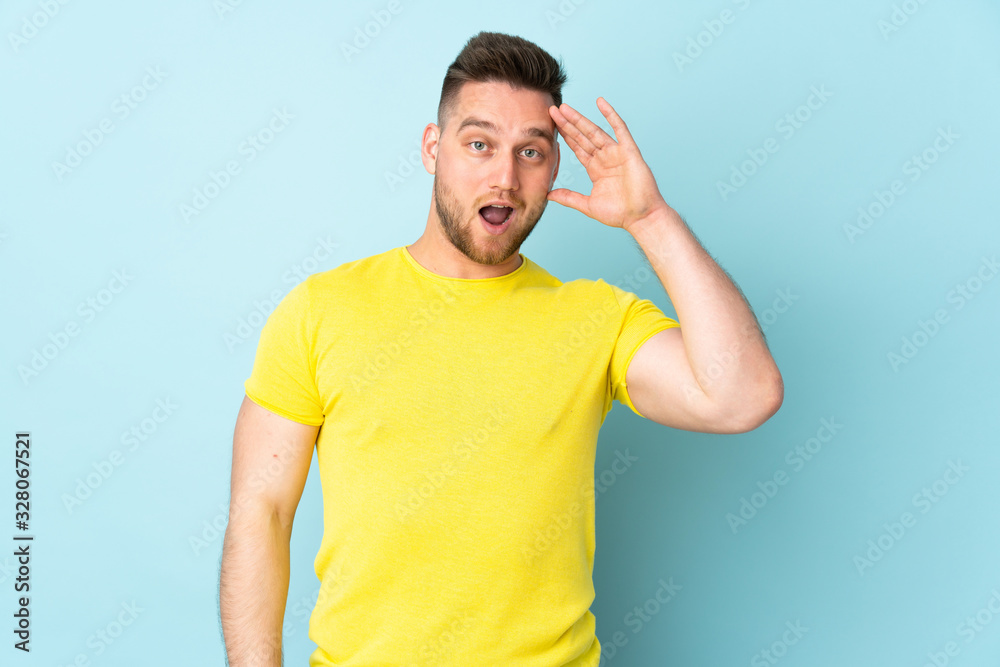 Russian handsome man isolated on blue background has realized something and intending the solution Russian handsome man isolated on blue background has realized something and intending the solution