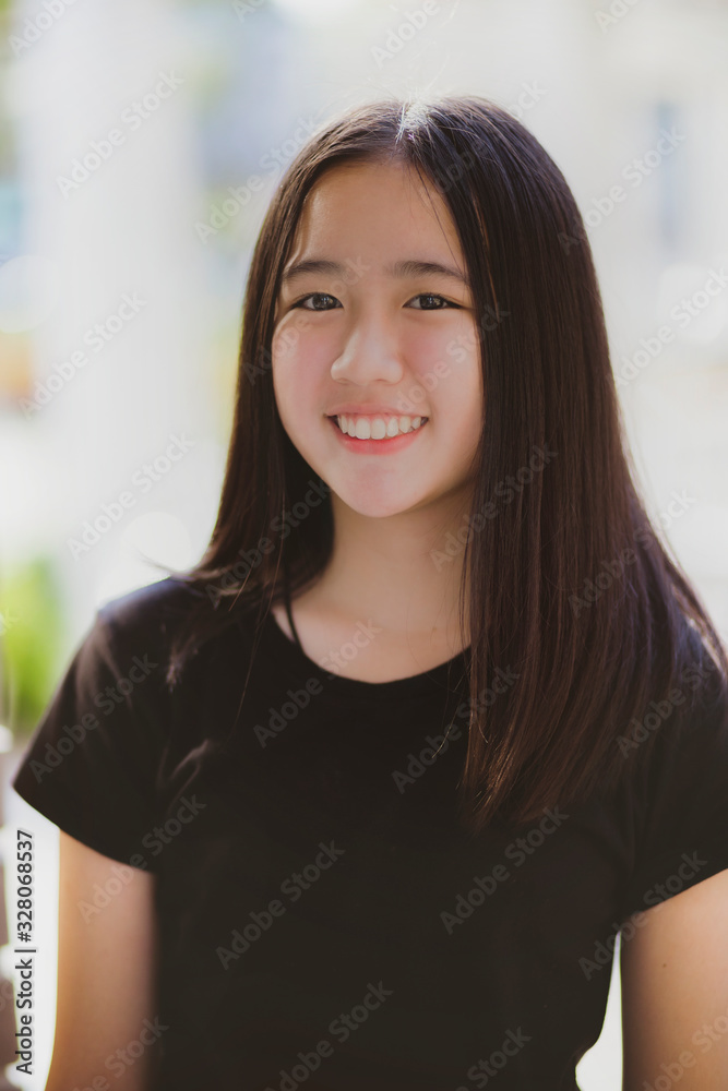 portrait asian teenager looking eye contact with happiness smiling face portrait asian teenager looking eye contact with happiness smiling face
