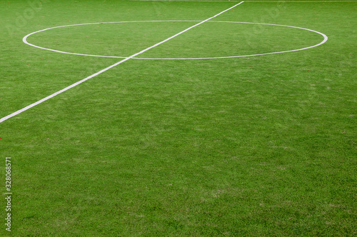 Closeup of green grass surface on soccer court