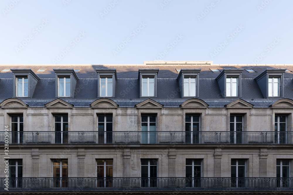 Typical roofs and facades details of buildings in Paris, France