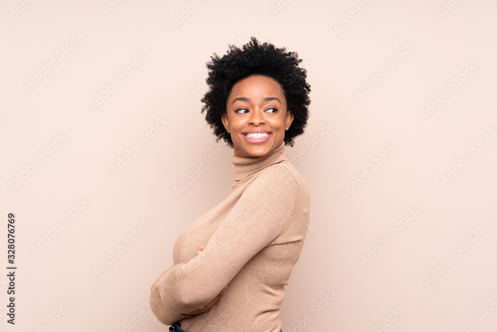 African american woman over isolated background with arms crossed and happy African american woman over isolated background with arms crossed and happy