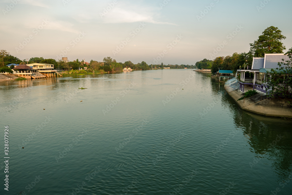 Evening view of the Mae Klong River Is a river that is used to travel in the past to the present. beautiful nature background.