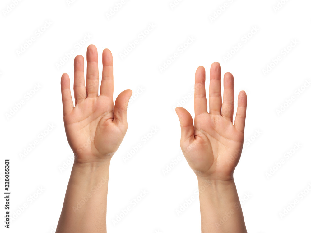 female hand is raised up with an open palm, part of the body is isolated on a white background female hand is raised up with an open palm, part of the body is isolated on a white background