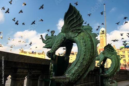 Bronze chimera Dragon figures statues in front of the Copenhagen City Hall, Denmark. February 2020