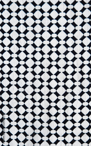The texture of the fabric. Black and white background.