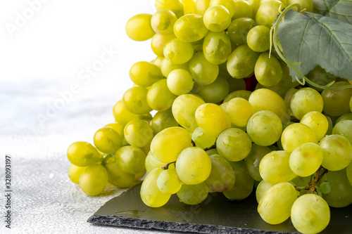Macro Photo food green grapes berries. Image fresh berries fruit white grapes on branch