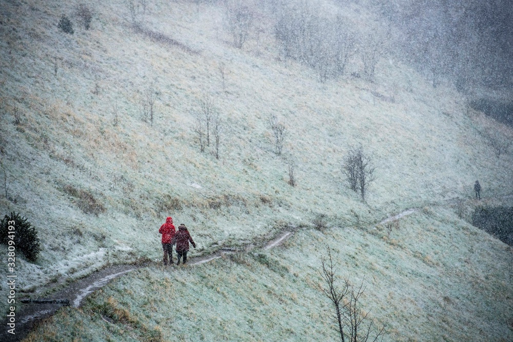 Tourists are caught in snowfall at Arthur's seat as Storm Ciara bring extreme weather to Scotland...Credit: Euan Cherry