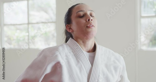 Judoka tired and breathing after training photo