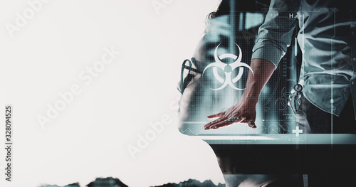 Double exposure of feamle face with medical science doctor wotking with modern computer in biohazard sign UI at lab or hospital. photo